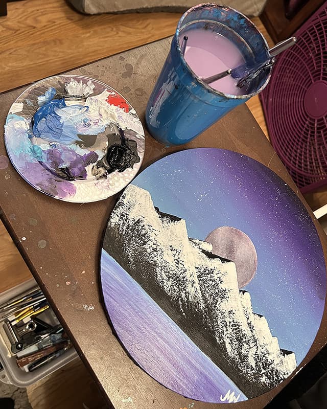 circle Mountains with paint water and palette